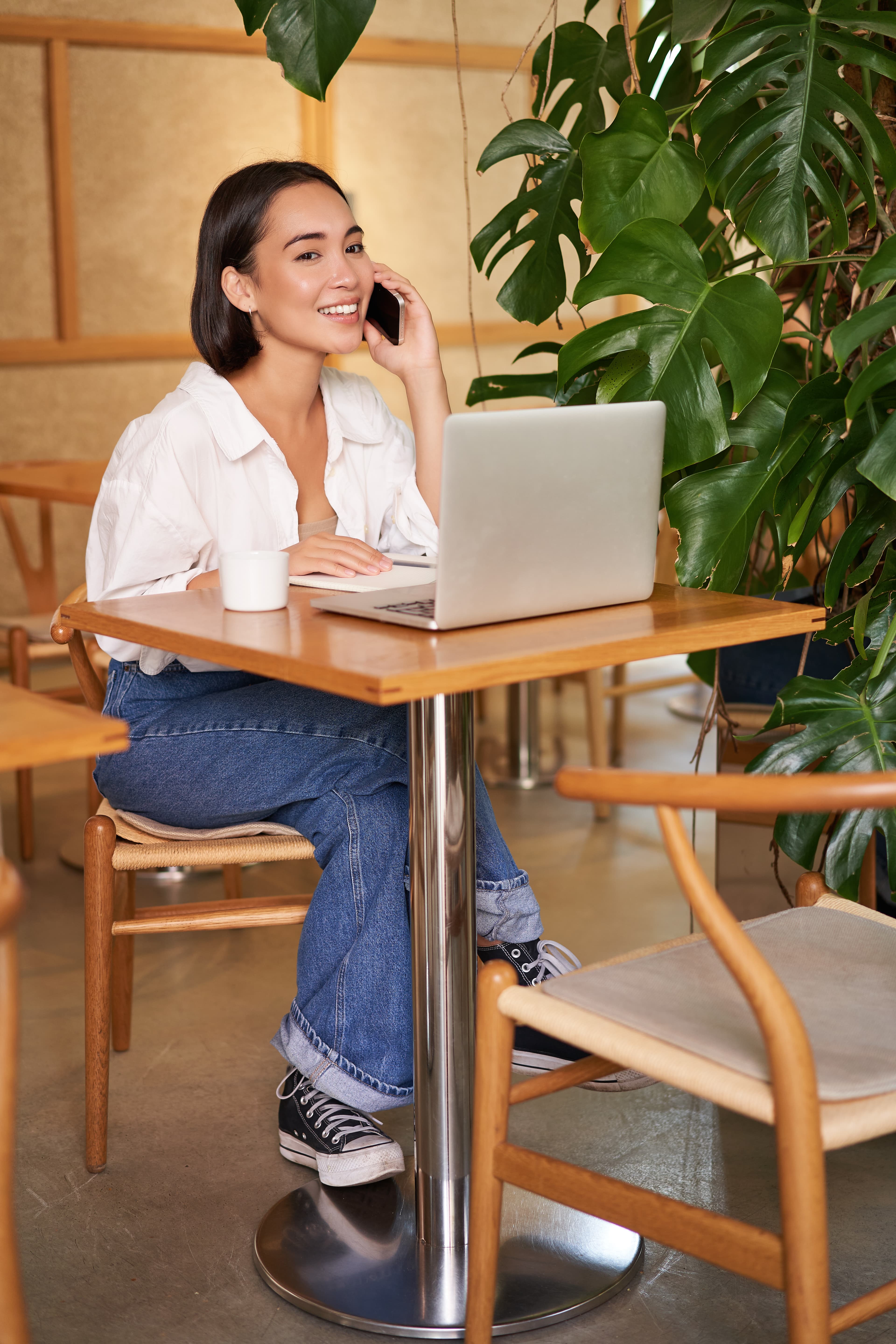 Professional working with AI assistant